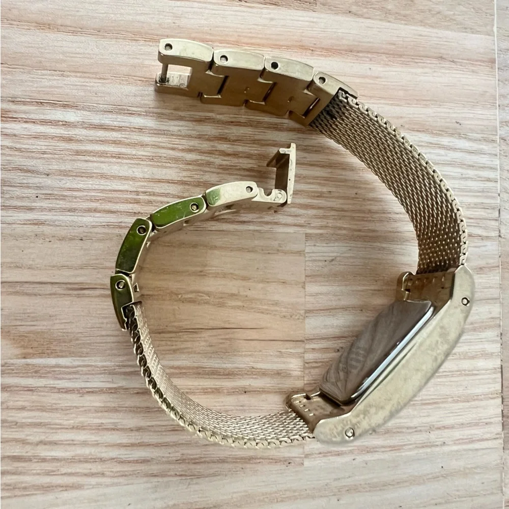 Kenneth Cole New York ladies rectangular gold tone dress watch NEW BATTERY